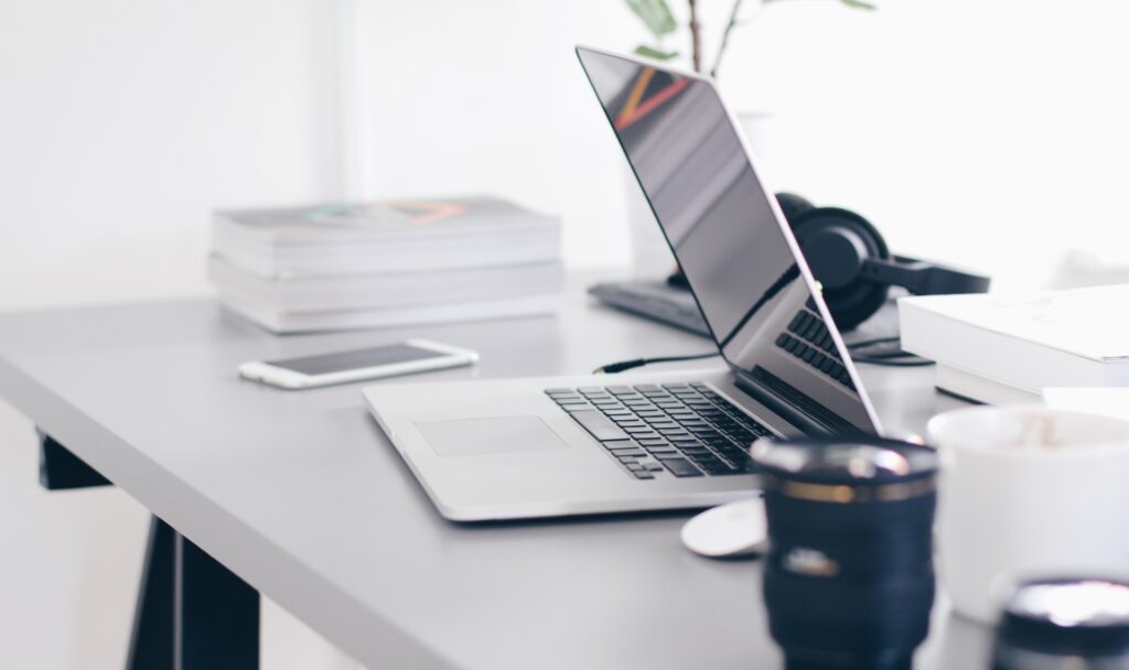 A laptop on a desk.