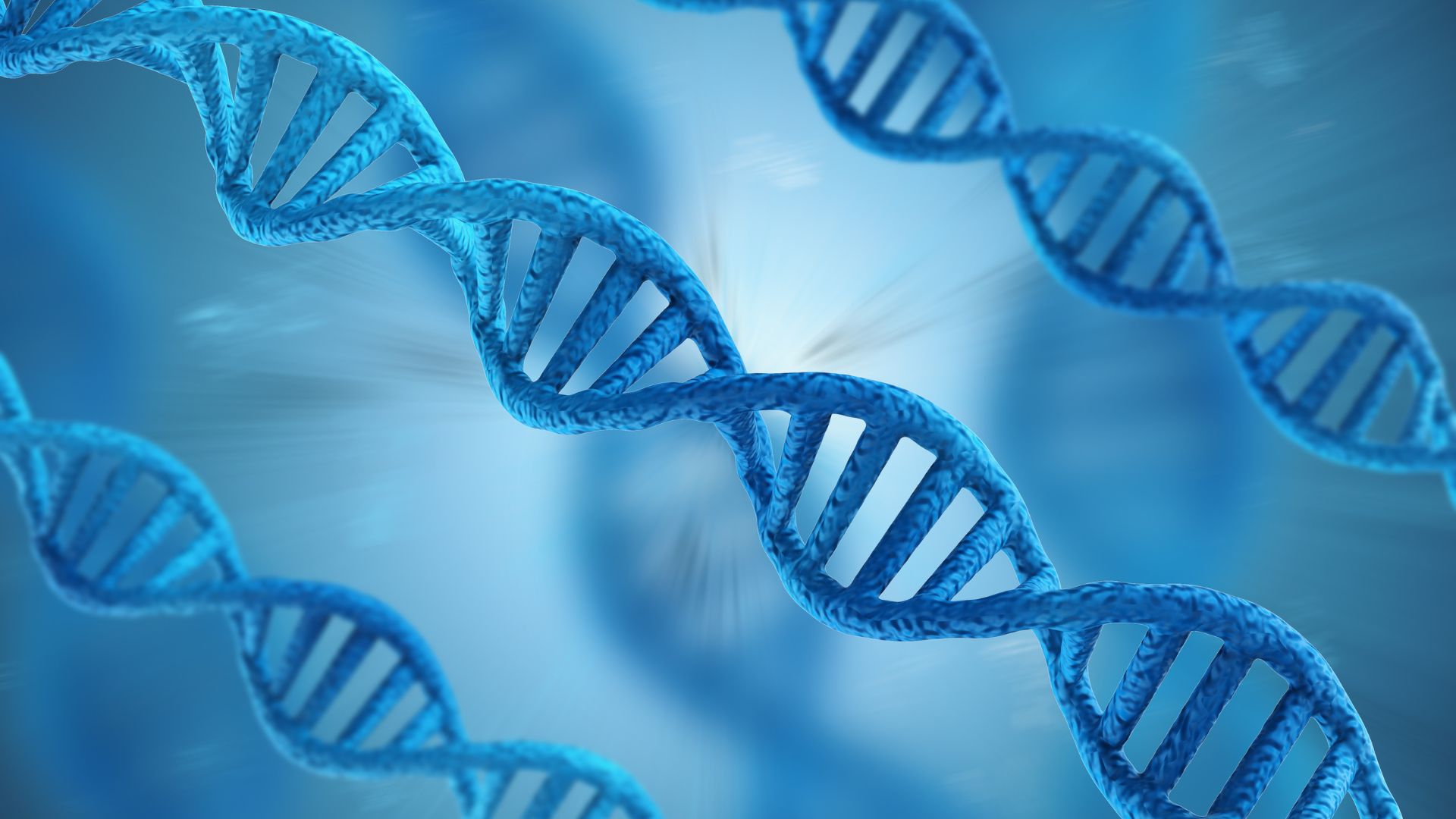 Close-up illustration of blue DNA helices against a blue background, highlighting the double-helix structure, genetic sequences, and integrating multi-omics data.